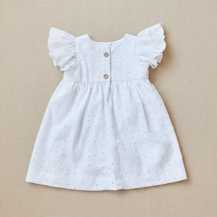 back of white eyelet dress