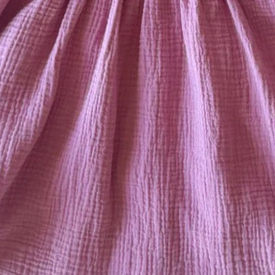 Close-up of textured pink fabric