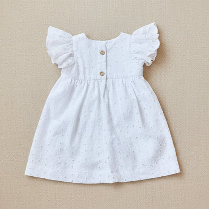 back of white eyelet dress